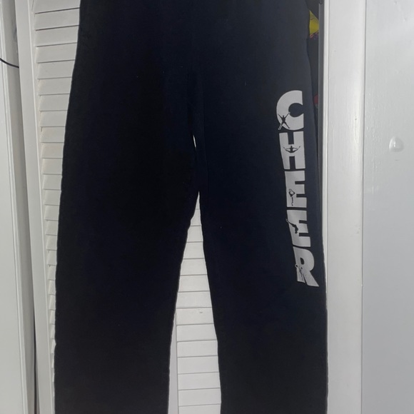 Gildan Pants - Medium Sized, black sweatpants with “CHEER” down the leg.